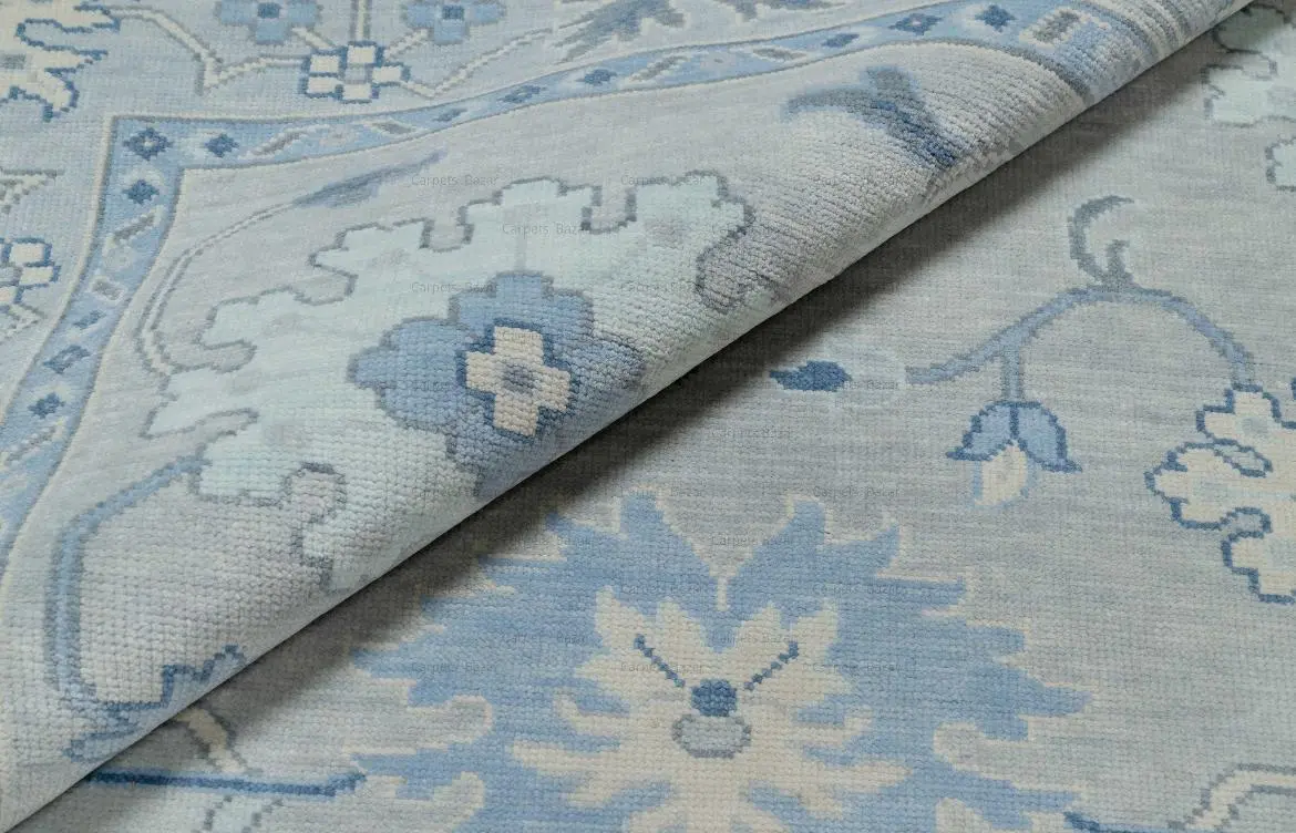 hand-knotted round woolen rug