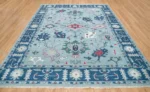 vintage hand-knotted woolen Oushak rug traditional design