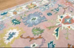 vintage oushak hand knotted woolen rug Bhadohi India cream floral design