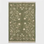 Sage green hand knotted wool rug with floral vine design handcrafted in Bhadohi India