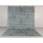 dark green geometric hand knotted rug