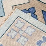 hand knotted Indian rug in living room setting