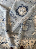 soft ivory Turkish carpet with floral motifs